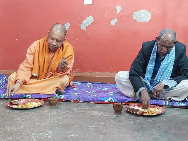 UP CM Yogi Adityanath at a Dalit house